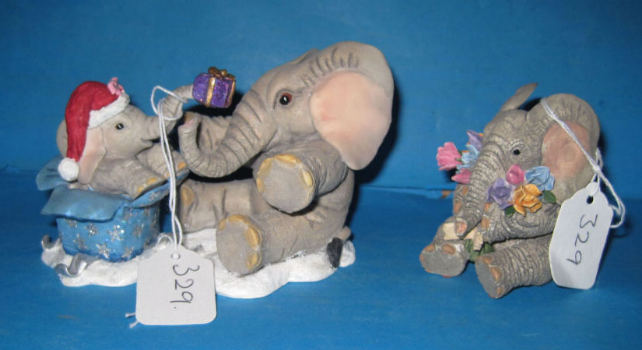 Appraisal: Tuskers Elephant Figures Henry Henrietta Surprise and A Bunch of