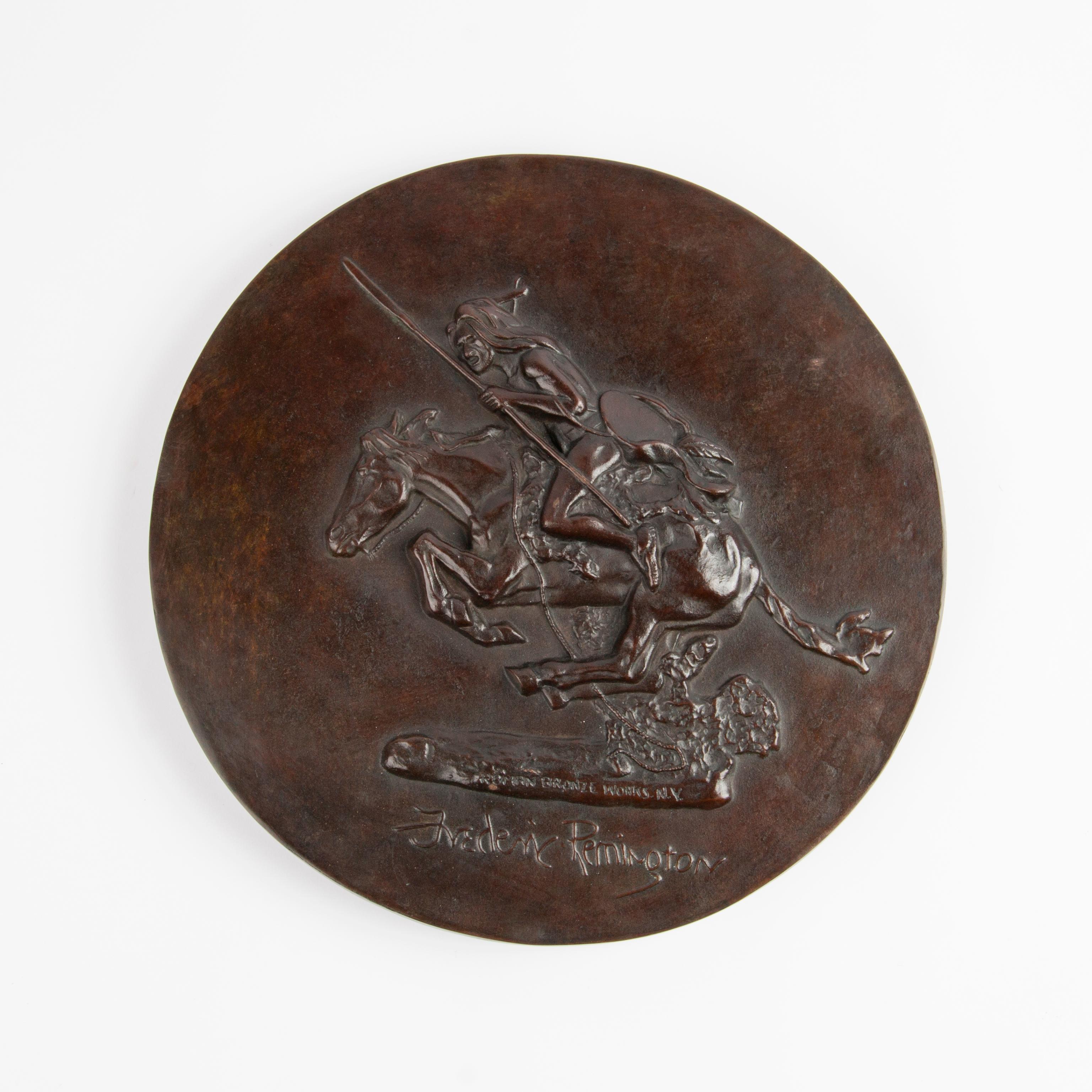 Appraisal: THE CHEYENNE ROMAN BRONZE WORKS PLAQUE AFTER REMINGTON A bronze