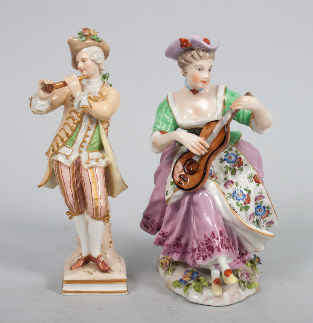 Appraisal: Two Austrian porcelain figures KPM piper in th century attire