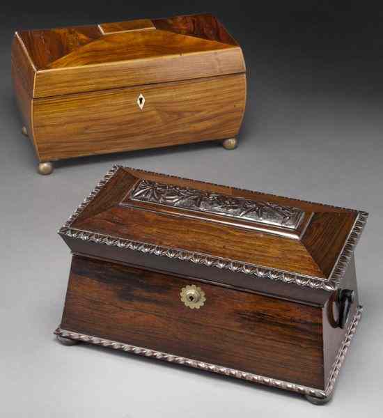 Appraisal: English sarcophagus form tea caddieswith fitted interiors including dark rosewood