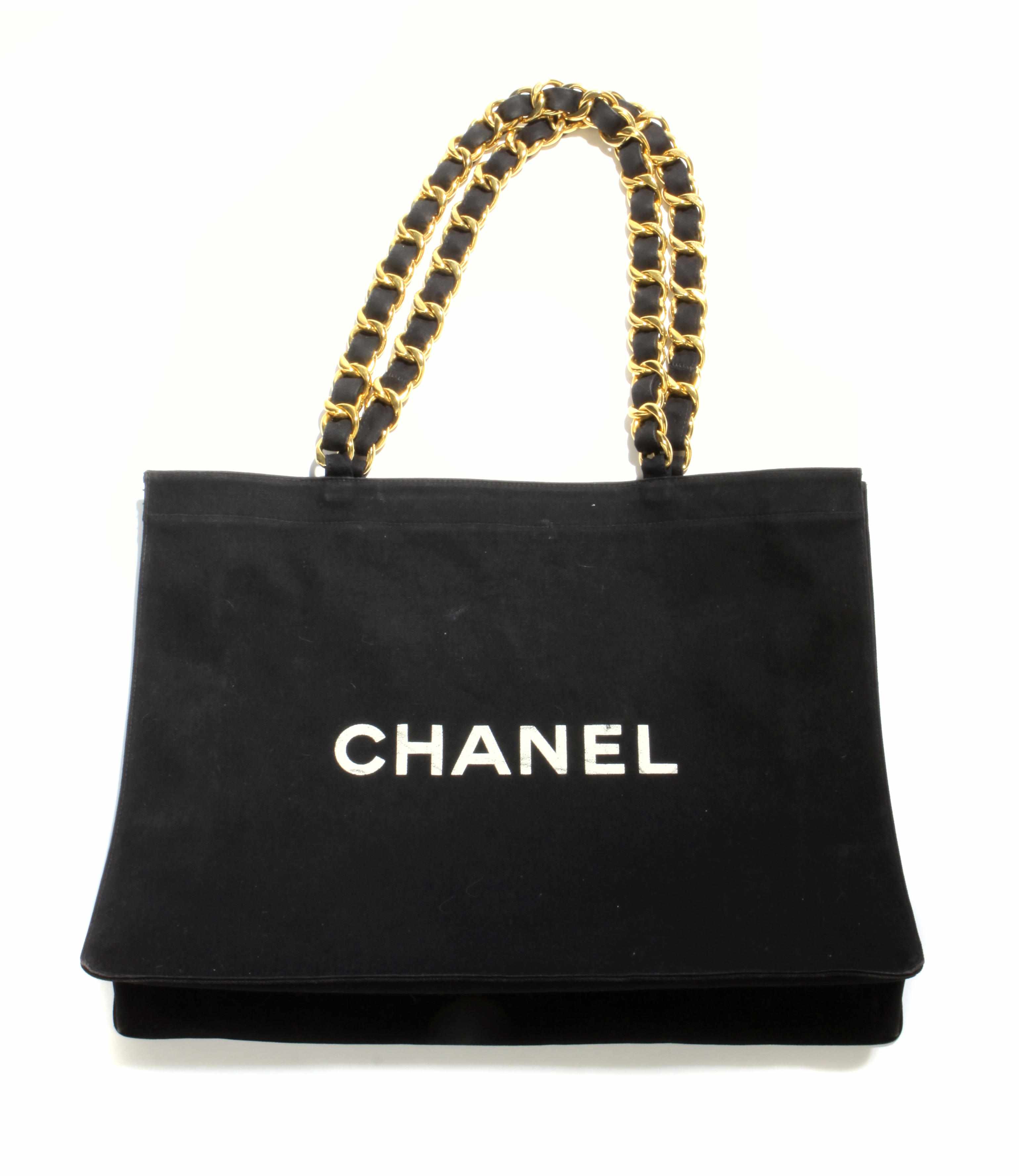 Appraisal: A Chanel black with white canvas shoulder bag with canvas