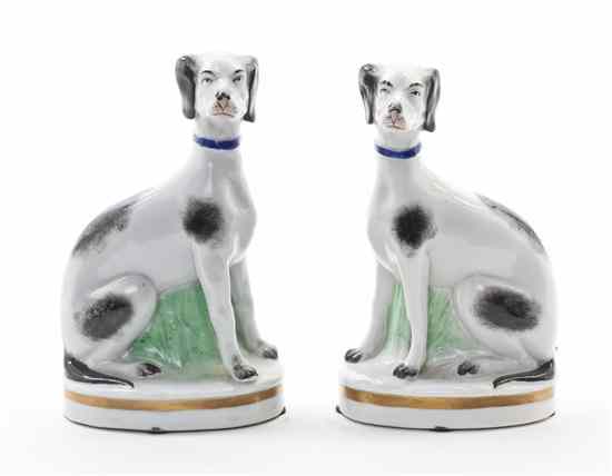 Appraisal: A Pair of German Porcelain Dogs each depicted in a