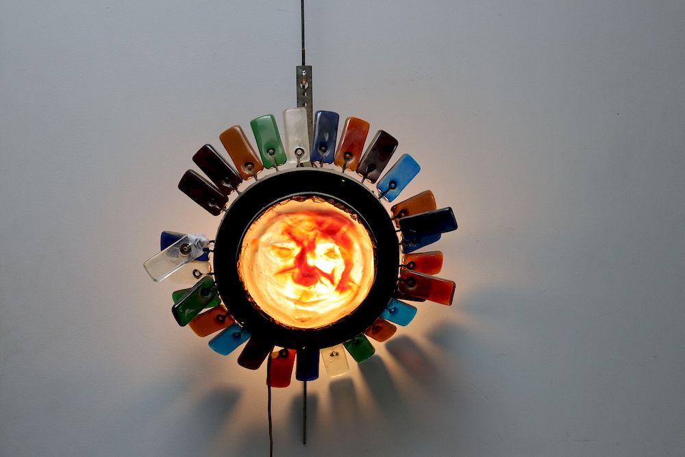 Appraisal: MIDCENTURY Glass Sunburst Style Lamp With Face Center A really