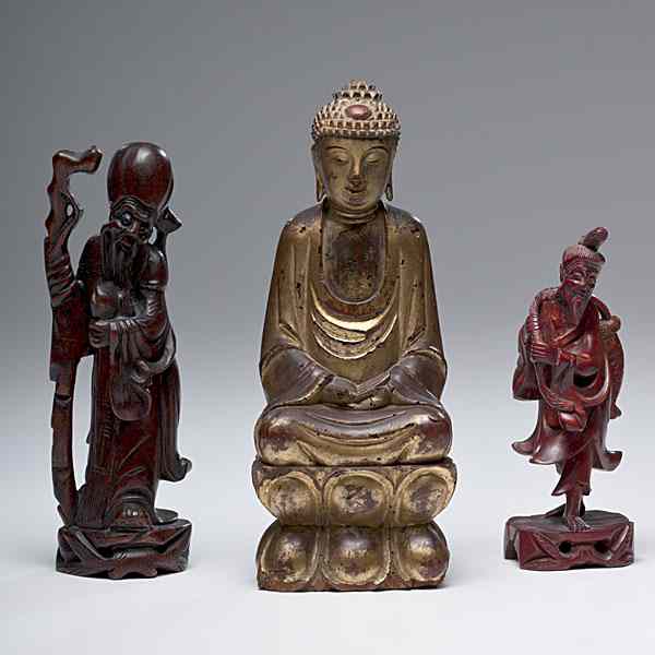 Appraisal: Chinese Wooden Figures Chinese a group of wooden figures including