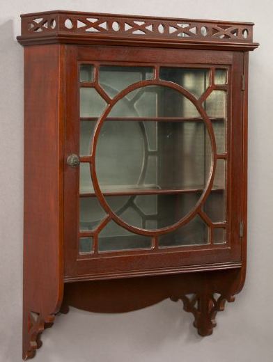 Appraisal: Edwardian Carved Mahogany Hanging Cabinet first quarter th century in