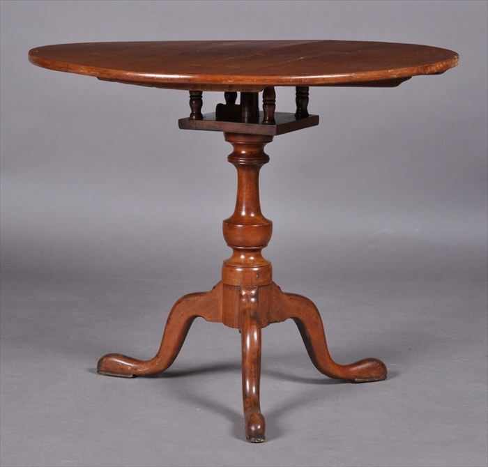 Appraisal: AMERICAN CHIPPENDALE MAPLE TILT-TOP TEA TABLE The round top tilting