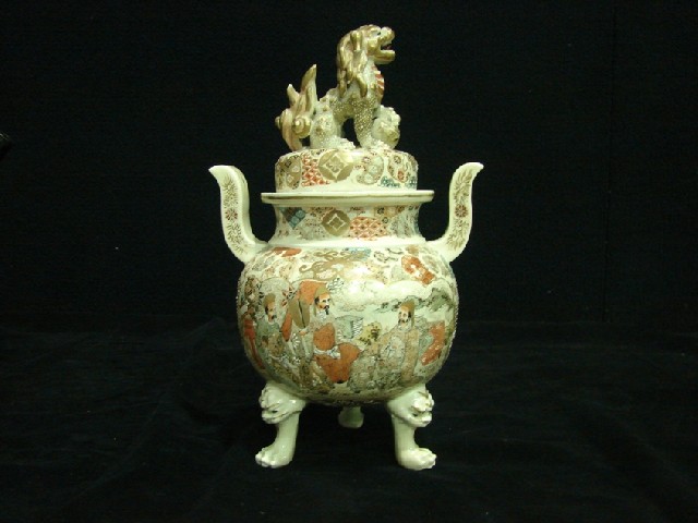 Appraisal: A Satsuma earthenware koro and cover The lid surmounted by