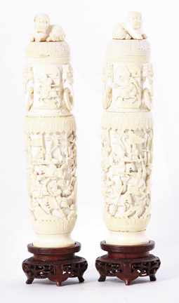 Appraisal: Pair Chinese carved ivory covered vases foo dog covers on