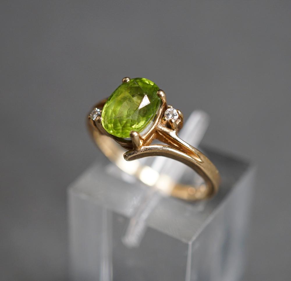 Appraisal: -KARAT YELLOW-GOLD PERIDOT AND DIAMOND RING GROSS DWT SIZE -Karat