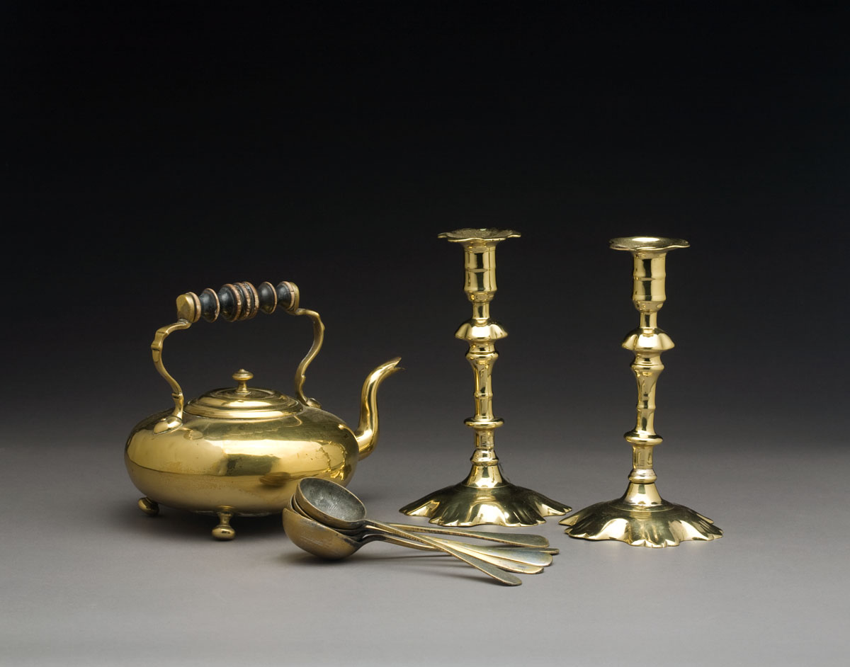 Appraisal: GROUP OF ENGLISH BRASS TABLEWARES Comprising a pair of Queen