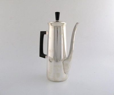 Appraisal: By A E Jones a modern silver coffee pot of