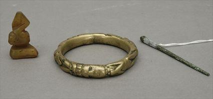 Appraisal: Brass Fertility Bracelet Together with a small South Sea Island