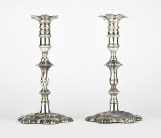 Appraisal: A pair of George IV sterling silver candlesticks Sheffield each