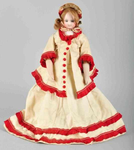 Appraisal: Exquisite Swivel Neck French Fashion Doll Description On a kid