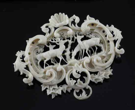 Appraisal: A th century Continental carved ivory brooch with deer within