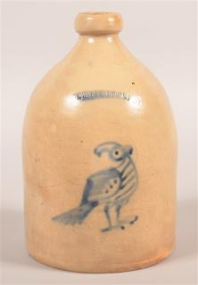 Appraisal: Whites Stoneware Jug with Blue Slip Bird Decoration Whites Utica