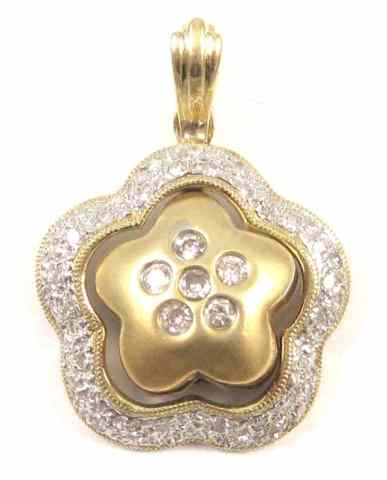 Appraisal: SAPPHIRE AND DIAMOND PENDANT k yellow and white gold The