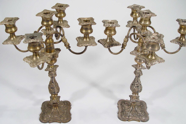 Appraisal: Pair of silver plated five branch candelabra moulded with flowers