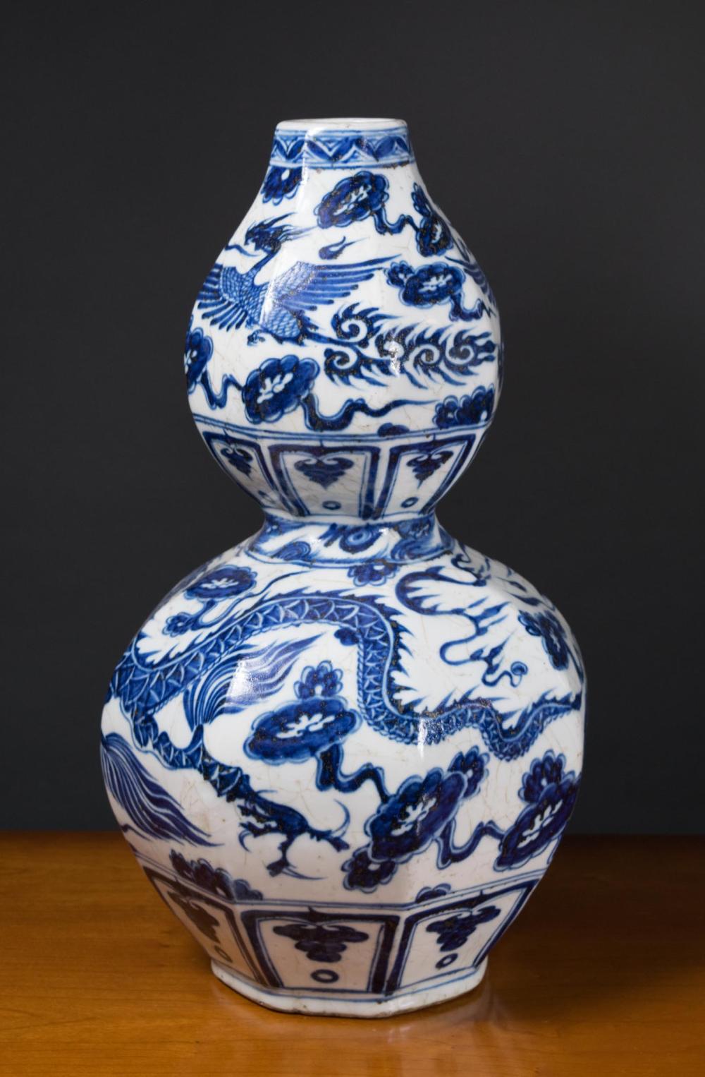 Appraisal: CHINESE BLUE AND WHITE PORCELAIN VASE double gourd form hand