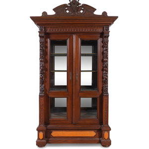 Appraisal: A Black Forest Style Carved Oak Cabinet th Century Height