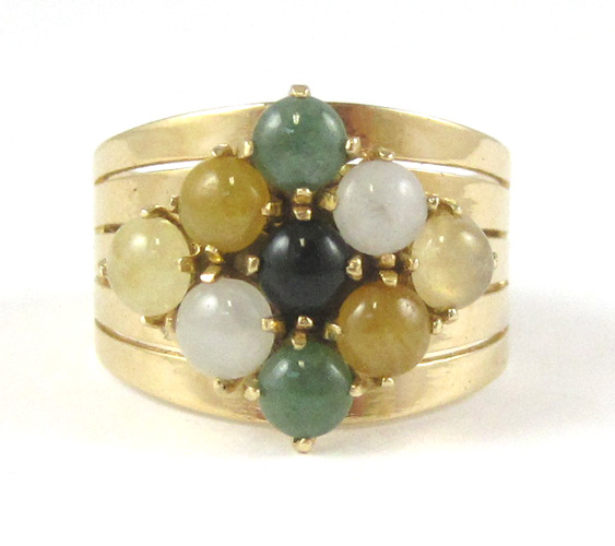 Appraisal: MULTI-COLOR JADE AND YELLOW GOLD RING The wide k yellow