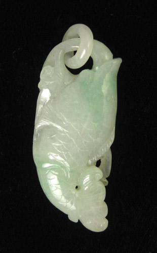 Appraisal: CARVED LIGHT GREEN JADE FISH PENDANT grams Length inches