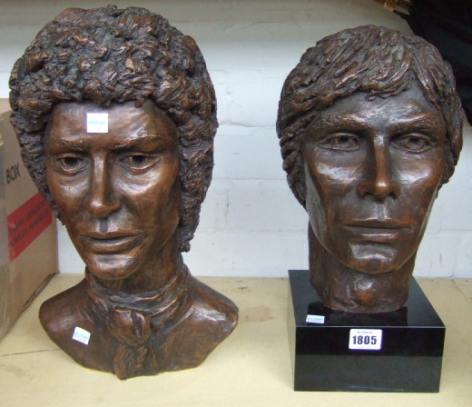 Appraisal: Two bronzed resin busts one female and one male late