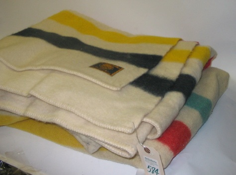 Appraisal: TWO PERCENT WOOL BLANKETS fashioned after a Native American and