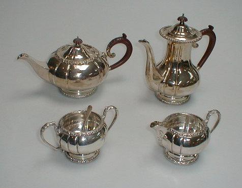 Appraisal: An electroplate on copper four-piece tea and coffee service of