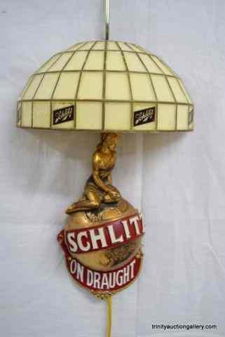 Appraisal: Schlitz Beer Lighted Wall Sconce Sign Is an authorized and