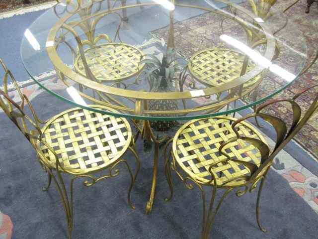 Appraisal: Gilt Metalwork Patio Table Chairs figural pineapple center '' diameter