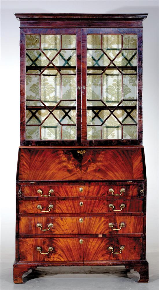 Appraisal: Georgian mahogany bureau bookcase circa dentil-molded crown over divided glazed