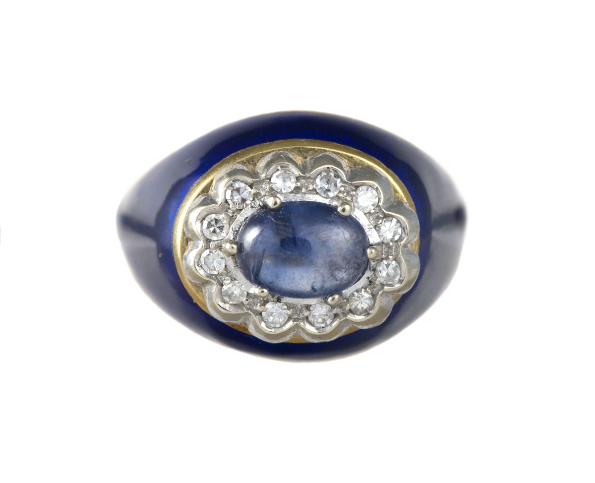 Appraisal: CABOCHON SAPPHIRE DIAMOND ENAMEL GOLD RING The ring is set