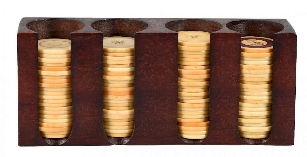 Appraisal: Poker Chip Set In Wooden Holder Chips are made of