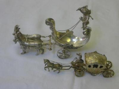 Appraisal: A VICTORIAN NOVELTY SALT modelled as a carriage being driven