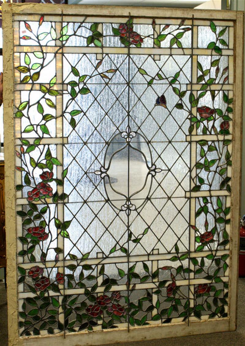 Appraisal: stained glass panels in a floral vine pattern the center