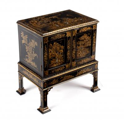 Appraisal: A th Century lacquered collector's cabinet with chinoiserie decoration throughout