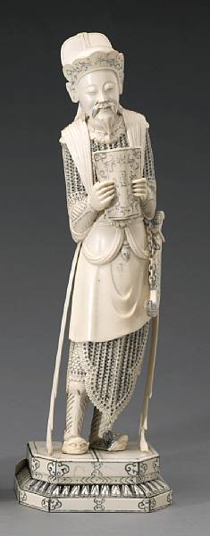 Appraisal: A pieced and tinted ivory figure of a warrior general