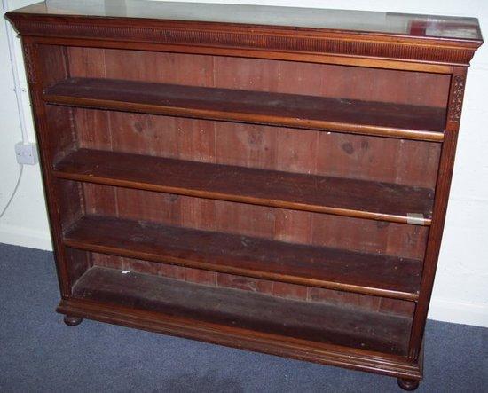 Appraisal: A late th Century mahogany open bookcase the rectangular top