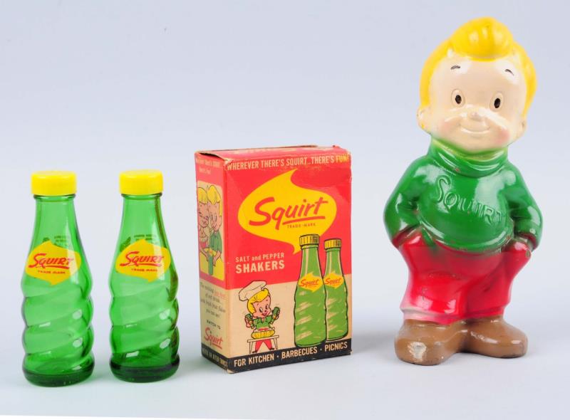 Appraisal: Lot Of Squirt Soda Advertising Items This lot includes a