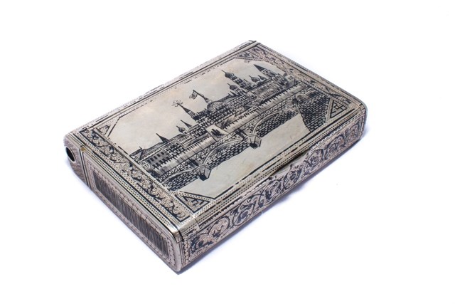 Appraisal: A Russian rectangular niello decorated cigarette case cum vesta box