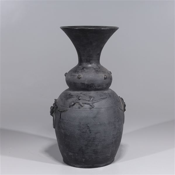 Appraisal: Chinese black glazed early style ceramic vase with molded dragons