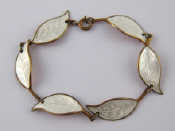 Appraisal: A Danish silver gilt and white enamel bracelet designed by