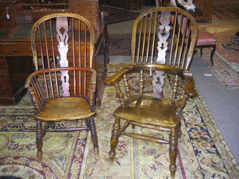 Appraisal: TWO ENGLISH TH CENTURY OAK WINDSOR ARMCHAIRS Both with bowed