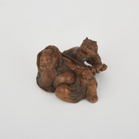 Appraisal: A Carved Wood Netsuke Meiji Period Delicately and dynamicially rendered