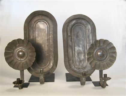 Appraisal: Two pair of tin candle sconces th century The first