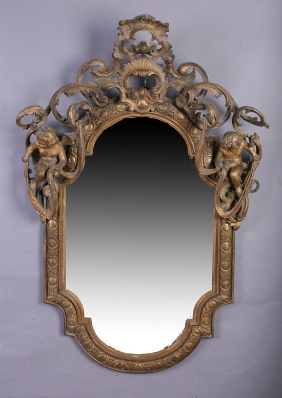 Appraisal: CONTINENTAL ROCOCO GILT WOOD WALL MIRROR th century Scrolling foliate