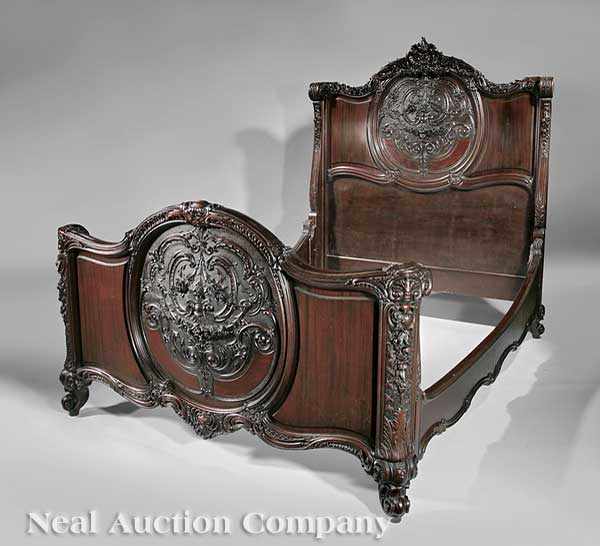 Appraisal: An Antique Carved Mahogany Four-Piece Bedroom Suite late th c