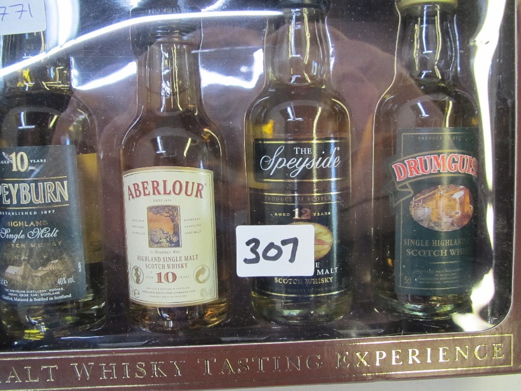 Appraisal: A lot comprising seven boxed sets of whisky miniatures -