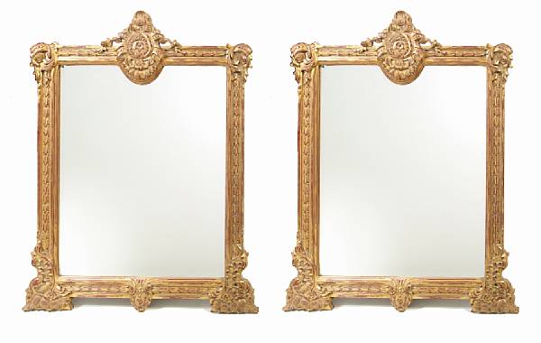 Appraisal: A pair of Louis XVI style carved giltwood mirrors height